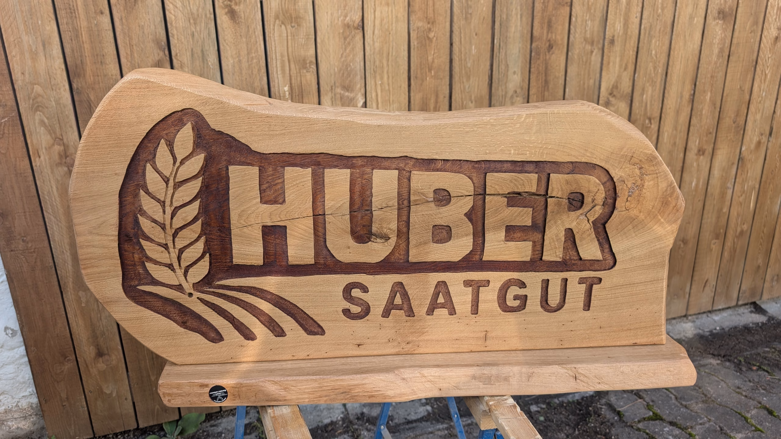 Eislogo ZAMeG mit LED-Beleuchtung – Eisskulptur für Firmenevent | Eisschnitzer Franken Carving