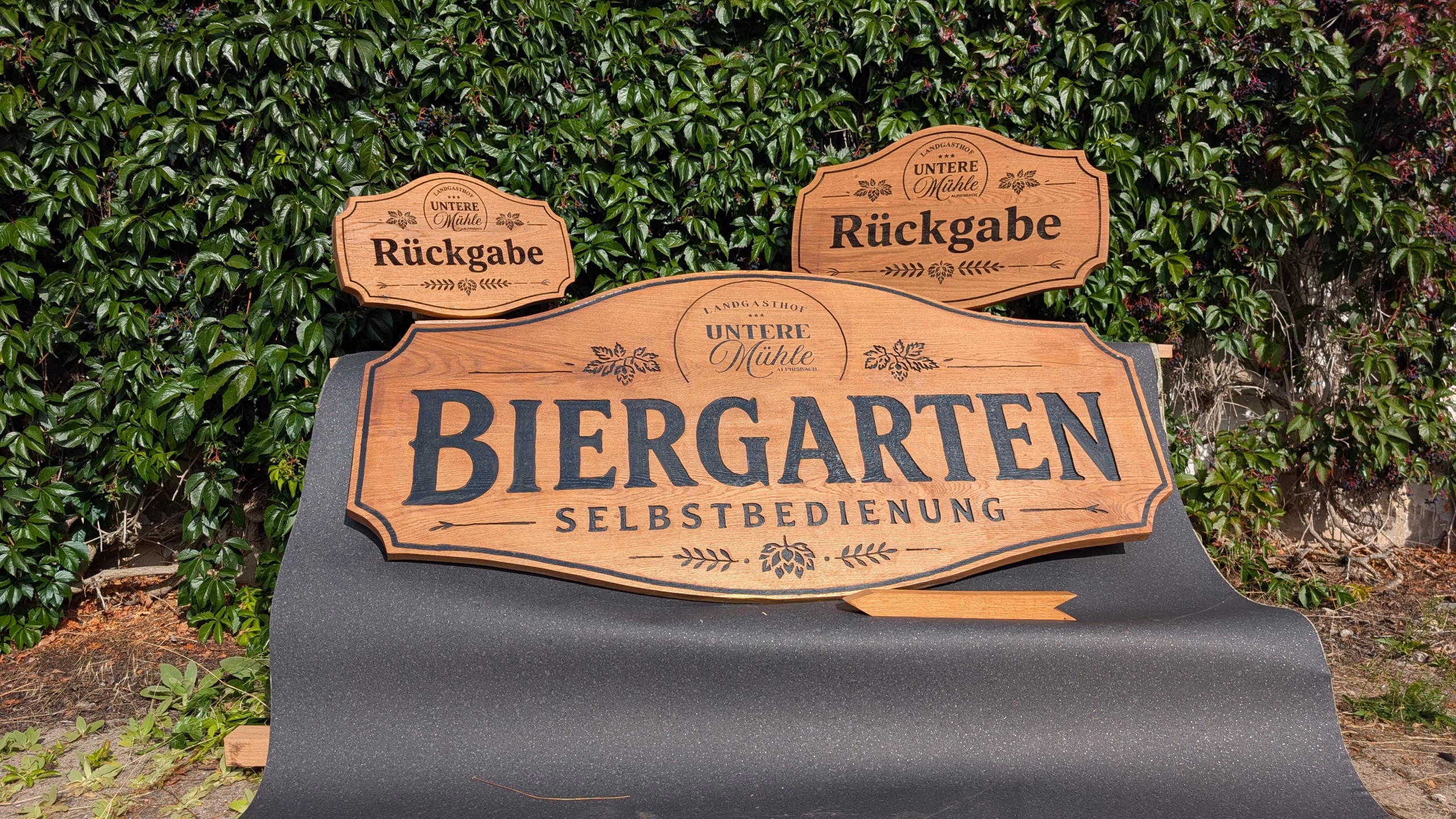 Eisbar mit REWE-Logo – Eislogo & Theke für Marken-Event | Eisschnitzer Franken Carving